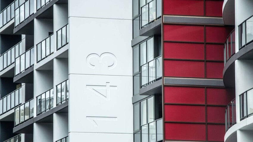 apartment building with red facade